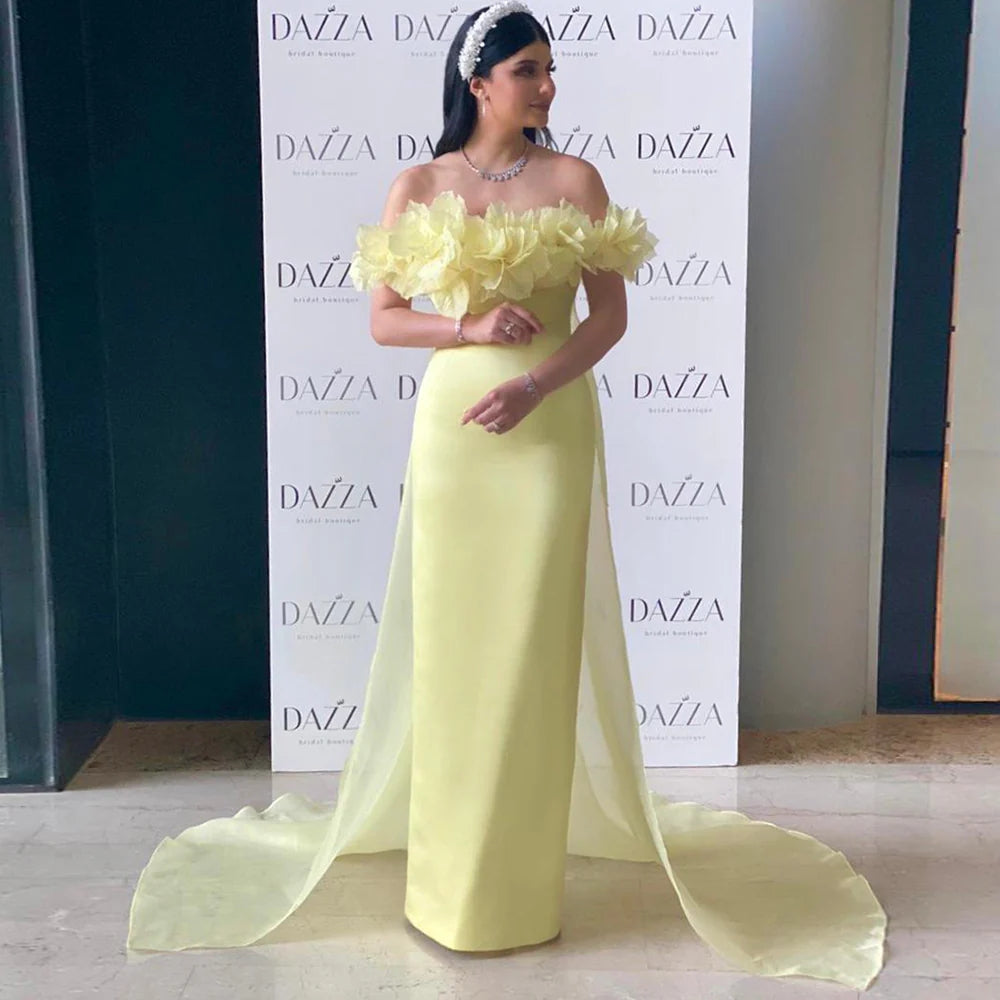 Light yellow evening dress with elegant 3D flowers and an overskirt model SF013