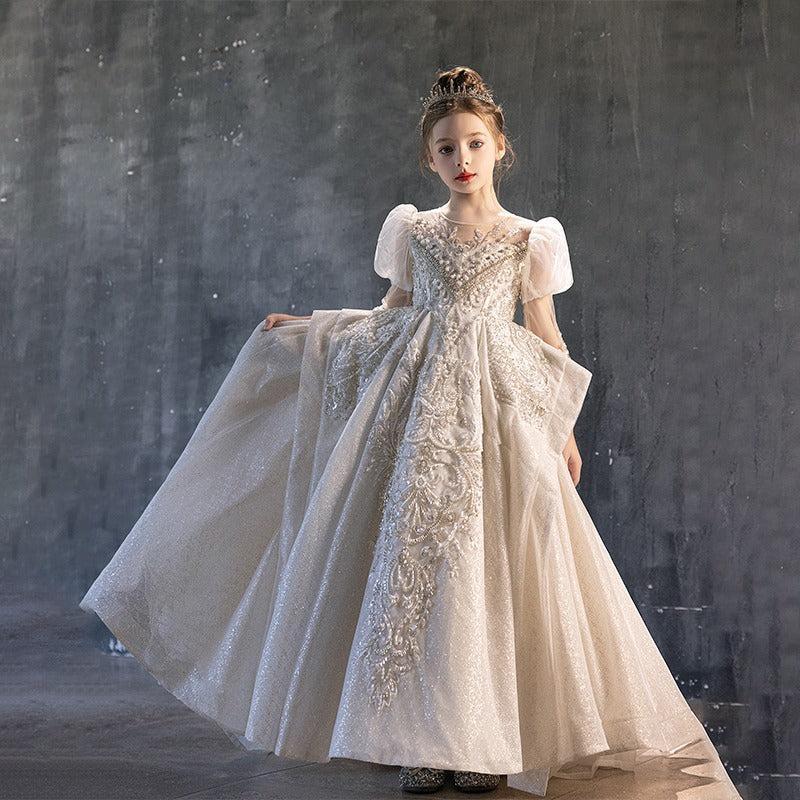 Junior bridesmaid dress in ivory for a coordinated wedding party look