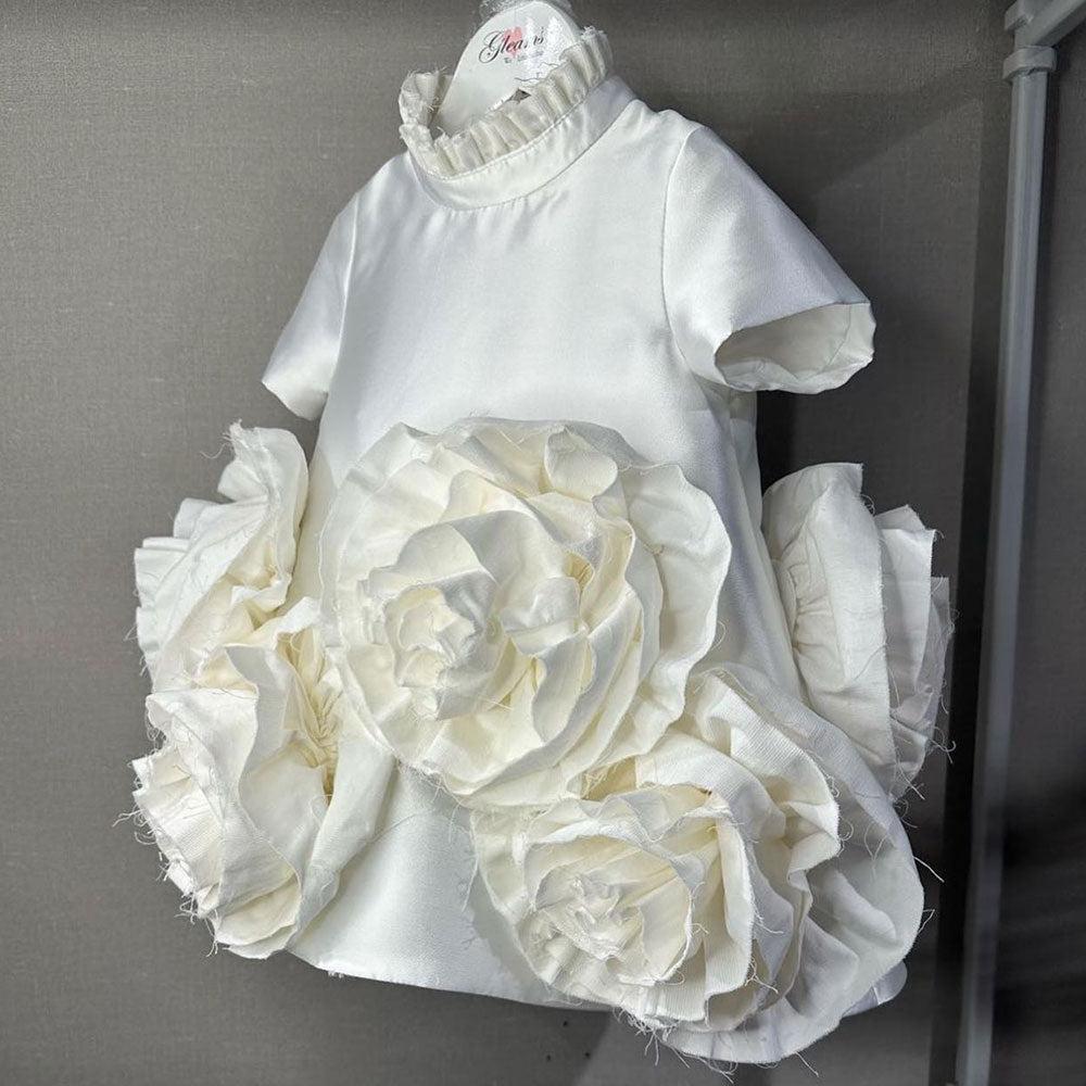 White princess flower girl dress with 3D flowers for a formal evening wedding
