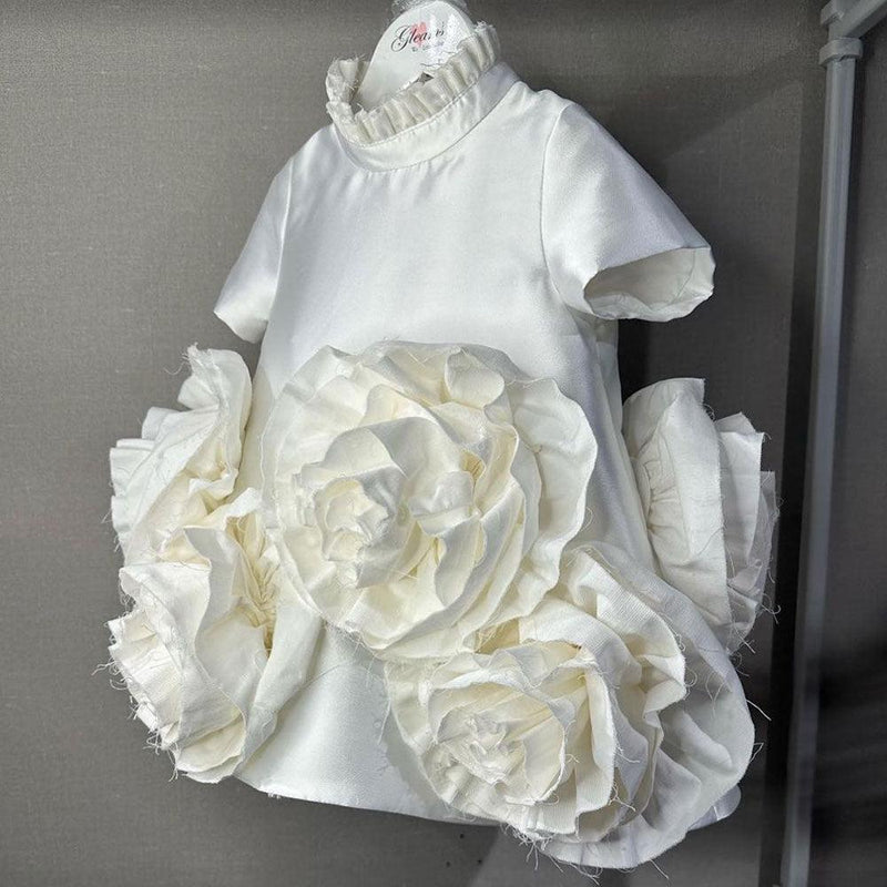 White princess flower girl dress with 3D flowers for a formal evening wedding
