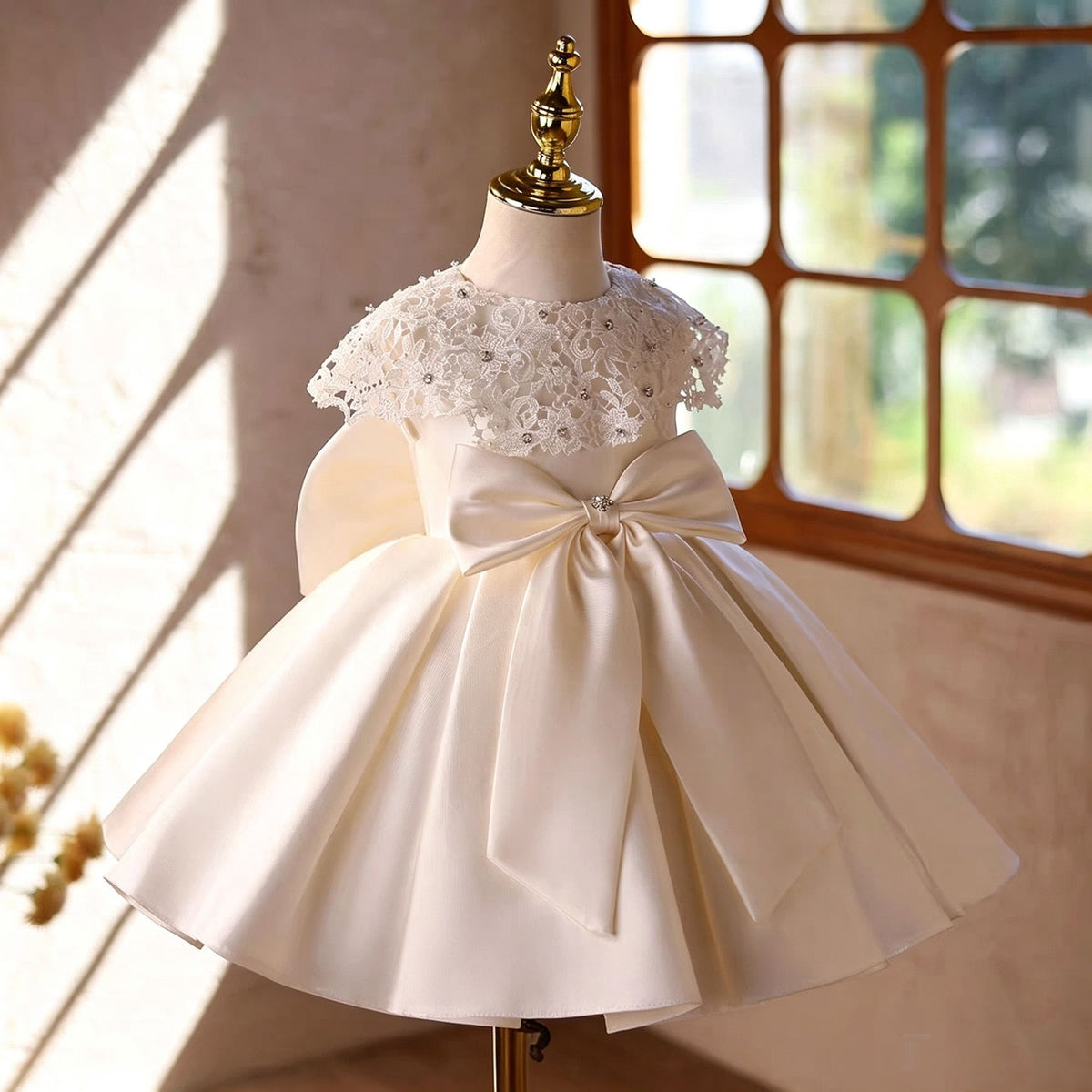 Ivory lace cape flower girl dress front view D295