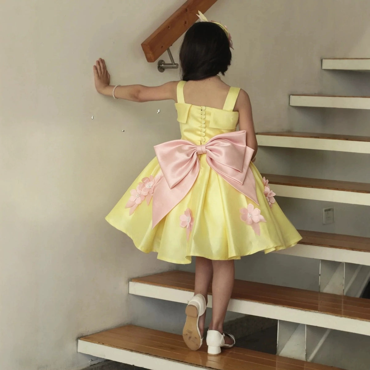 Yellow flower girl dress with pink floral accents and back bow D300