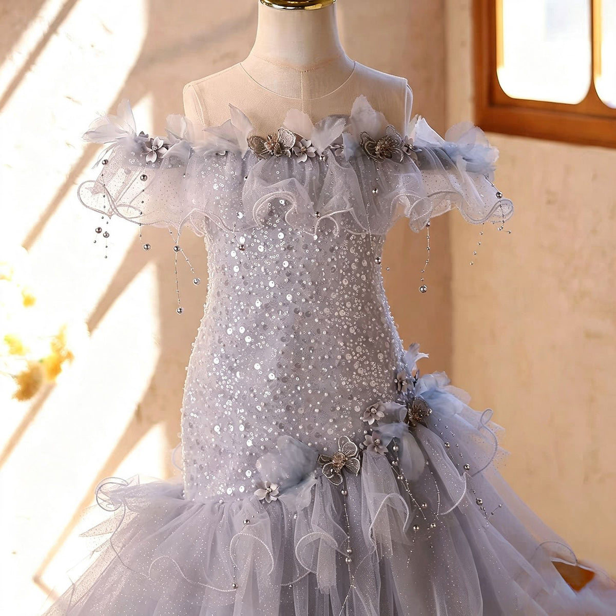 D367 blue ruffle tulle flower girl dress detail view
