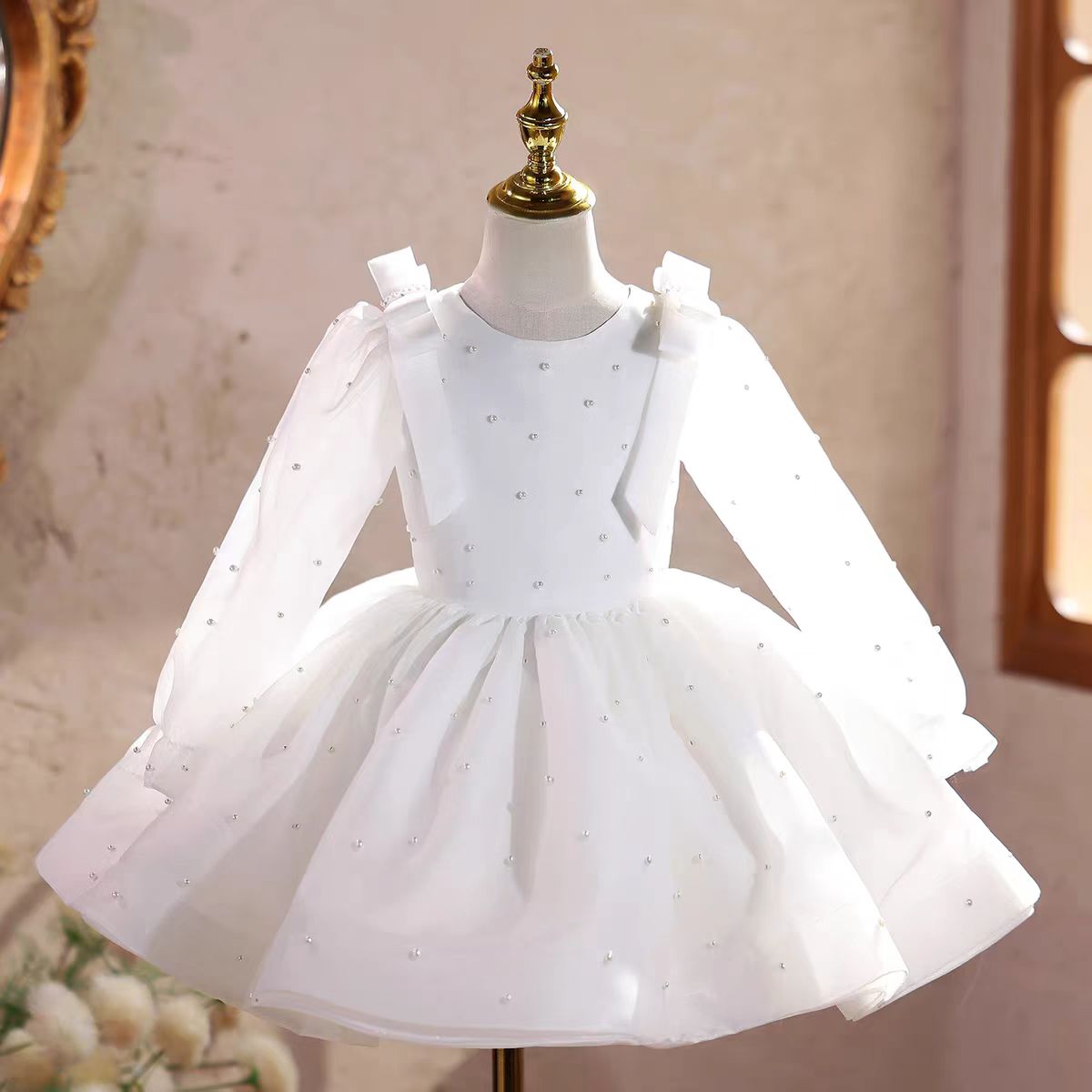 Elegant White Pearl Embellished Dress with Flowing Sleeves Perfect for Special Occasions M047