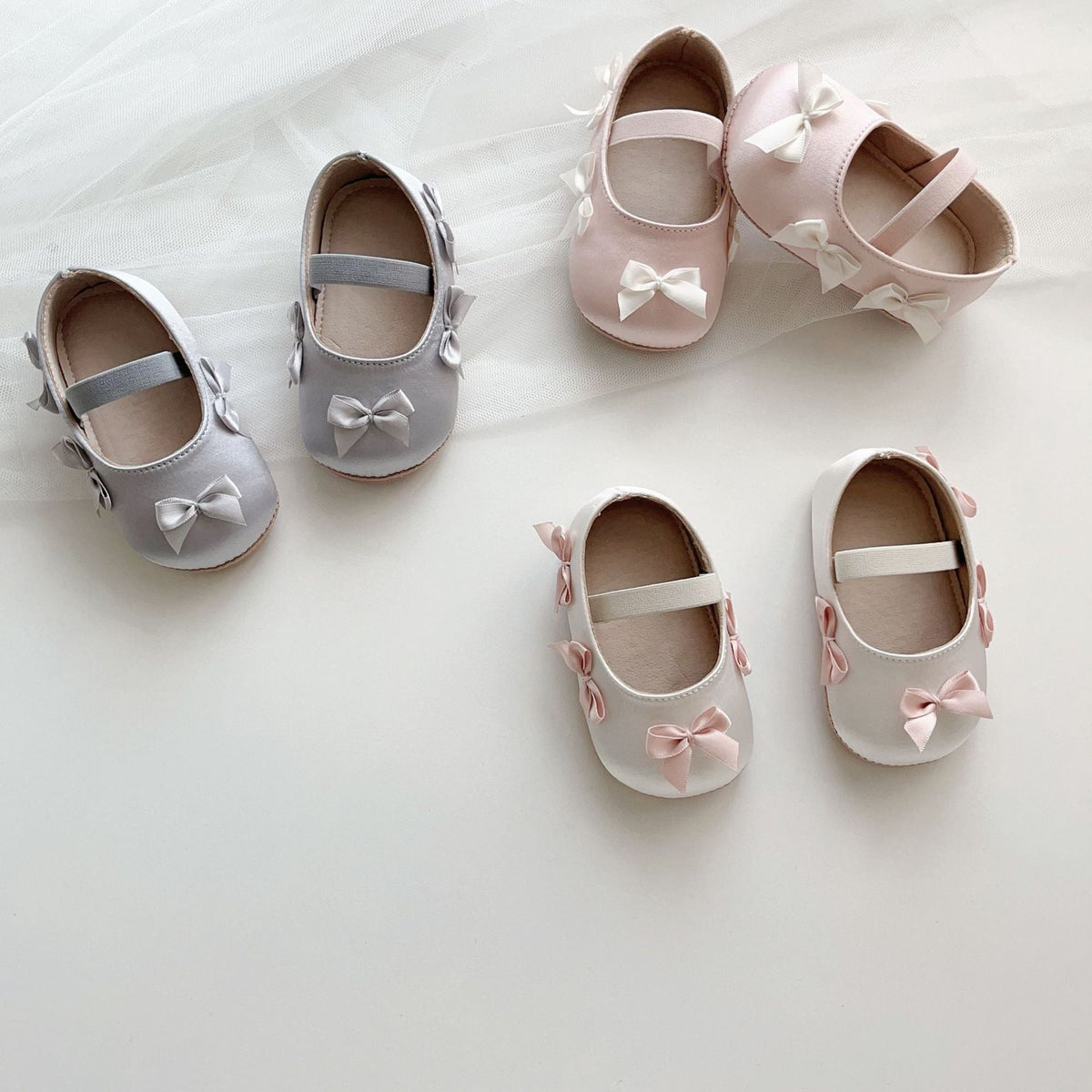 Baby pink, gray, and white bow Mary Jane flats