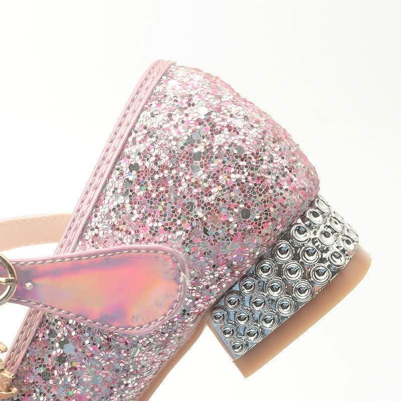 Detail of girls' pink rhinestone butterfly low heel